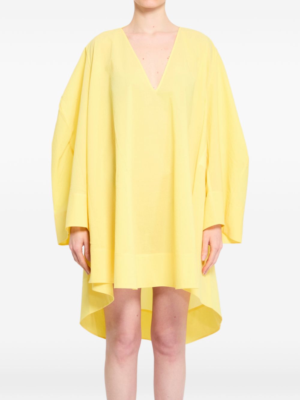 jacquemus yellow dress La Robe Baunhilha - it pairs beautifully with minimalist sandals and a structured clutch JACQUEMUS: Yellow Les Classiques 'La