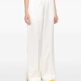 Pantaloni in raso in bianco Jil sander - donna 