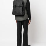 Zaino impermeabile con logo goffrato in nero Rains - unisex 
