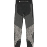Leggingsi con stampa serpente in nero Adidas by stella mc cartney - donna 