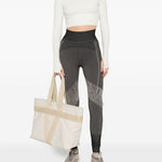 Leggingsi con stampa serpente in nero Adidas by stella mc cartney - donna 
