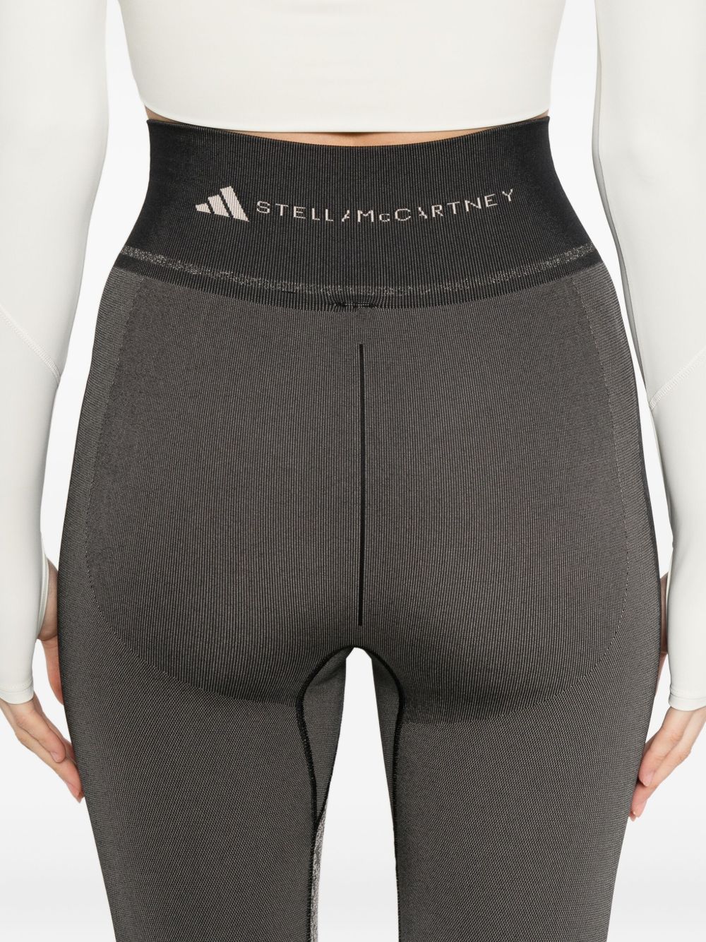 Leggingsi con stampa serpente in nero Adidas by stella mc cartney - donna 