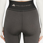 Leggingsi con stampa serpente in nero Adidas by stella mc cartney - donna 
