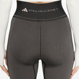 Leggingsi con stampa serpente in nero Adidas by stella mc cartney - donna 