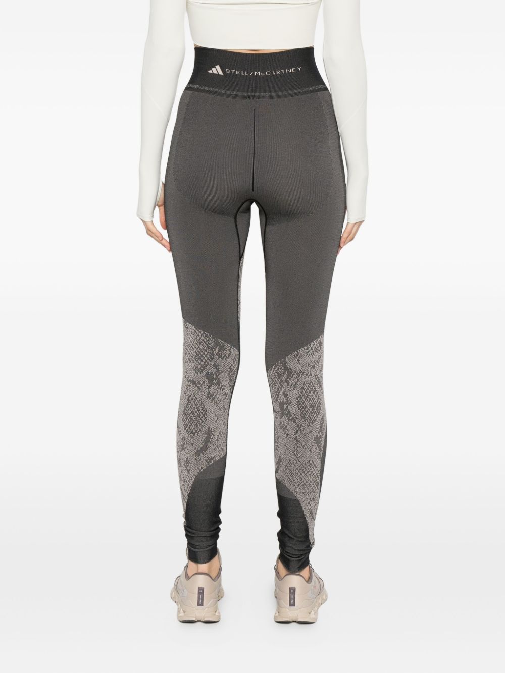 Leggingsi con stampa serpente in nero Adidas by stella mc cartney - donna 