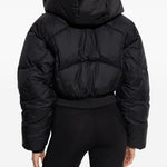 Giacca trapuntata con cappuccio in nero Adidas by stella mc cartney - donna 