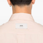 Camicia con logo posteriore in rosa chiaro Ami Paris - unisex 