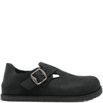 Sneakers con cinturino con fibbia in nero 