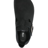 Sneakers con cinturino con fibbia in nero 