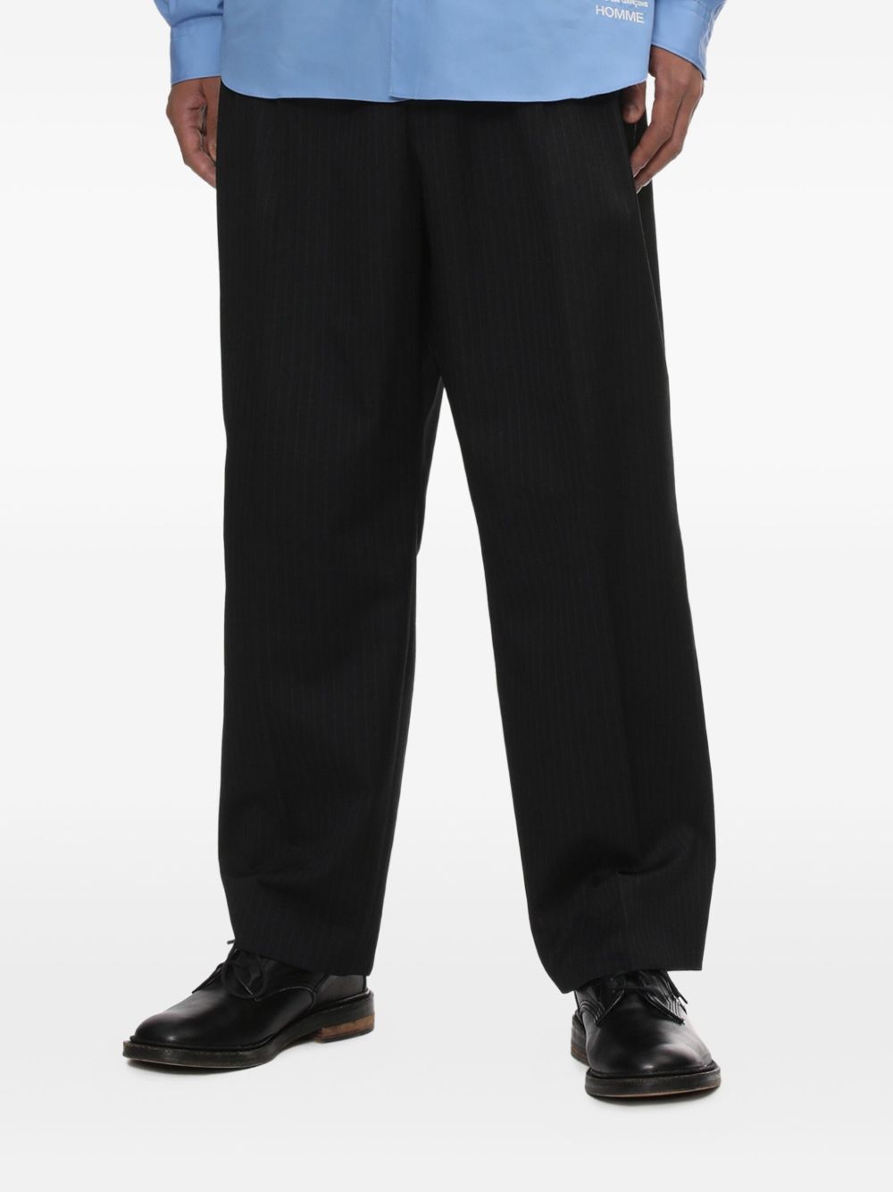 Pantaloni gessati con pieghe in nero Comme des garcons homme - uomo 