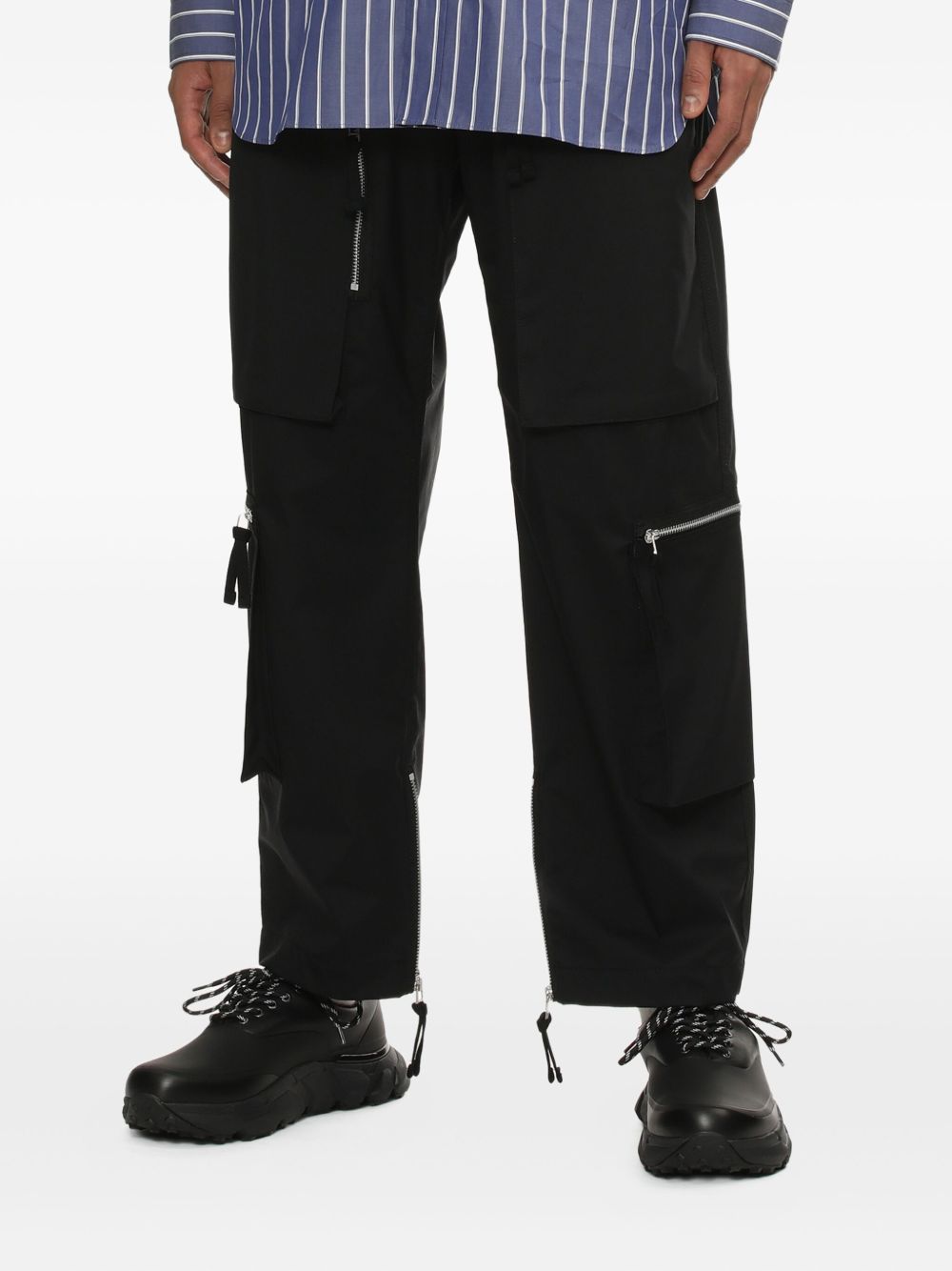 Pantaloni Cargo con zip in nero Comme des garcons homme - uomo 