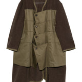 Cappotto con design a pannelli in verde Comme des garcons homme - uomo 
