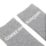 Calzini alti con logo in grigio Comme des garcons homme plus - uomo 