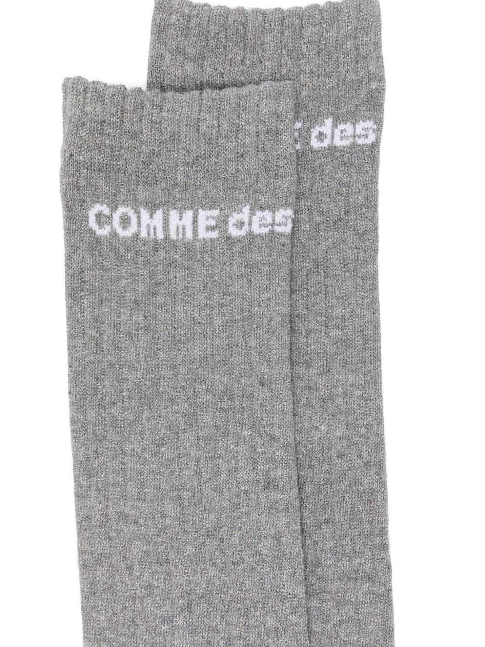Calzini alti con logo in grigio Comme des garcons homme plus - uomo 