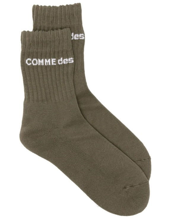 Calzini con logo in verde Comme des garcons homme plus - uomo<BR/><BR/> 