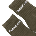 Calzini con logo in verde Comme des garcons homme plus - uomo<BR/><BR/> 