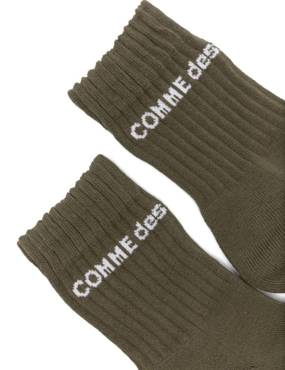 Calzini con logo in verde Comme des garcons homme plus - uomo<BR/><BR/> 