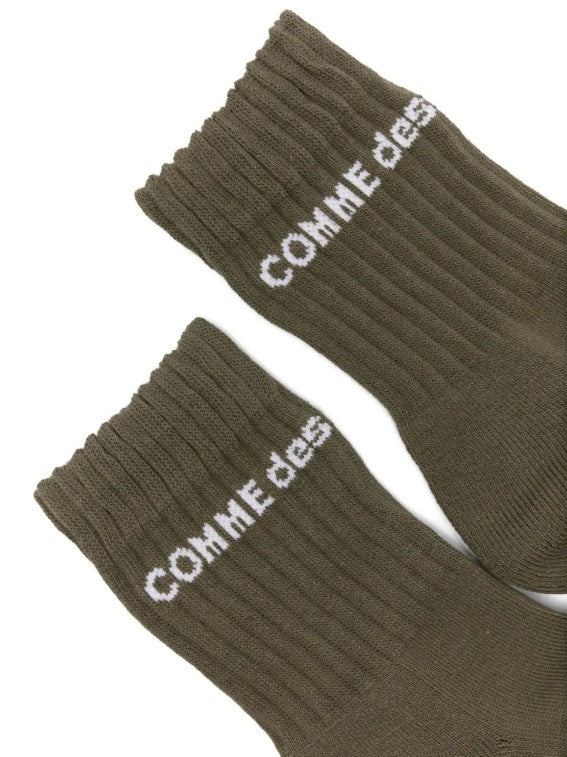 Calzini con logo in verde Comme des garcons homme plus - uomo<BR/><BR/> 