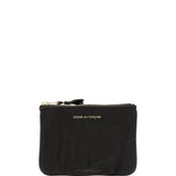 Portafoglio con logo goffrato in nero Comme des garcons wallet - unisex 