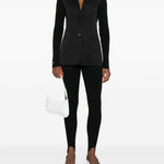 Leggings con staffe in nero Coperni - donna 
