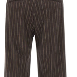 Pantaloni gessati con pieghe in marrone Drôle De Monsieur - donna 