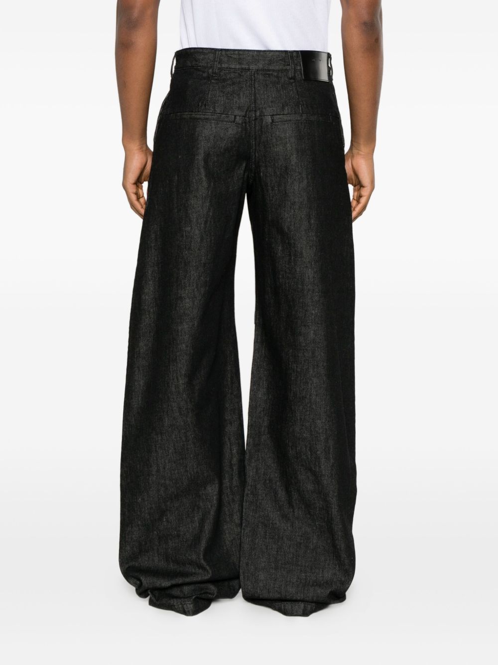 Jeans con tasche laterali in nero Entire studios - unisex 