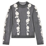 Top semi trasparente con applicazioni in nero e bianco Ganni - donna 