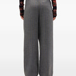 Pantaloni gessati con pieghe in grigio Ganni - donna 