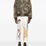 Jeans con stampa grafica in avorio KidSuper - uomo 