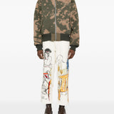 Jeans con stampa grafica in avorio KidSuper - uomo 