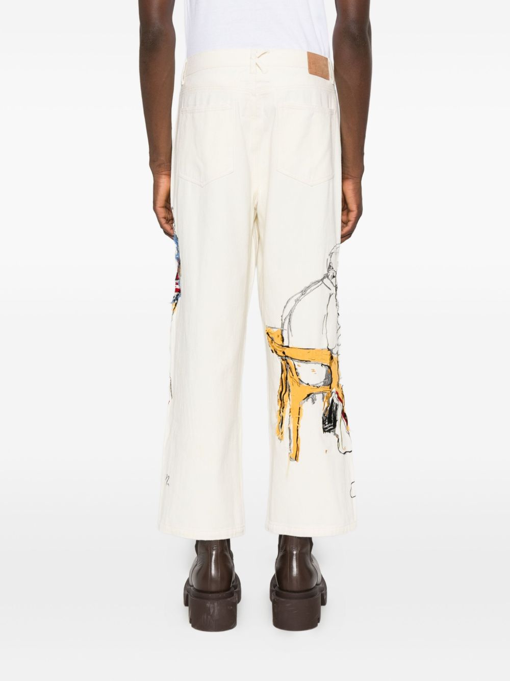Jeans con stampa grafica in avorio KidSuper - uomo 