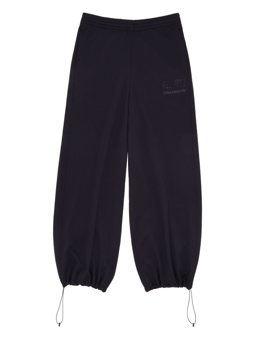 Pantaloni con coulisse sui orli in nero MM6 X Salomon - unisex 