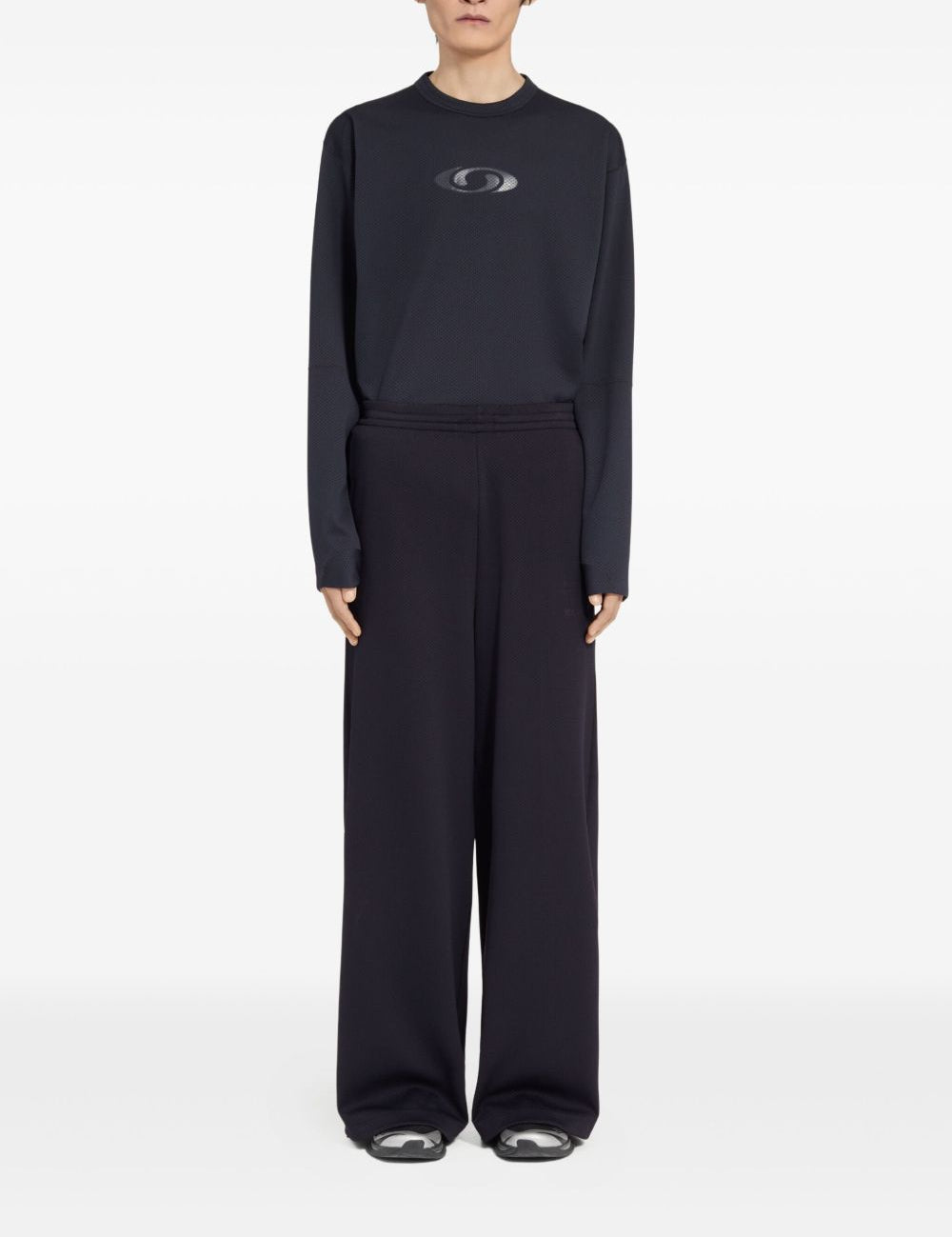 Pantaloni con coulisse sui orli in nero MM6 X Salomon - unisex 