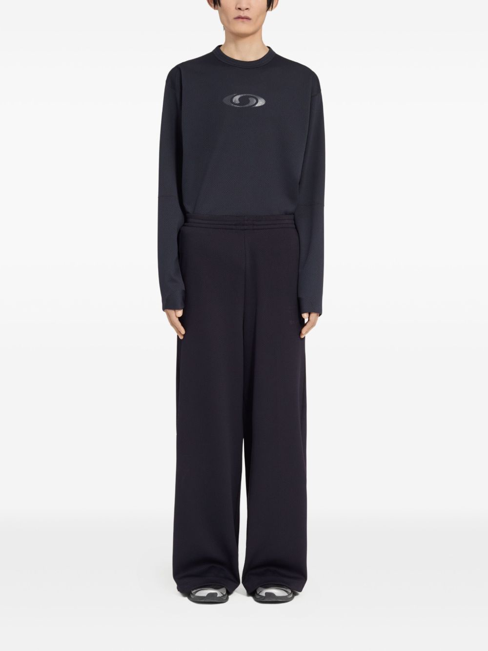 Pantaloni con coulisse sui orli in nero MM6 X Salomon - unisex 
