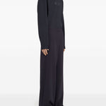 Pantaloni con coulisse sui orli in nero MM6 X Salomon - unisex 