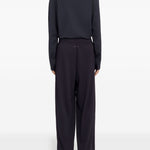 Pantaloni con coulisse sui orli in nero MM6 X Salomon - unisex 