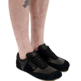 Sneakers con grafica numerica in nero 