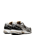 Sneakers basse 1906 in argento, oro e nero - unisex 