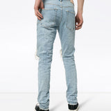 Jeans slim con strappi in blu Purple - uomo 