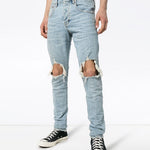 Jeans slim con strappi in blu Purple - uomo 