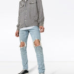 Jeans slim con strappi in blu Purple - uomo 