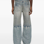 Jeans a gamba ampia con effetto vissuto in blu Purple - uomo 