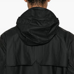 Parka rivestito con cappuccio e coulisse  in nero Rains - uomo 