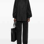 Parka rivestito con cappuccio e coulisse  in nero Rains - uomo 