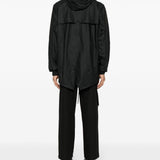 Parka rivestito con cappuccio e coulisse  in nero Rains - uomo 