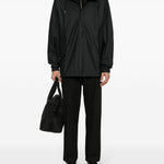 Parka rivestito con cappuccio e coulisse  in nero Rains - uomo 