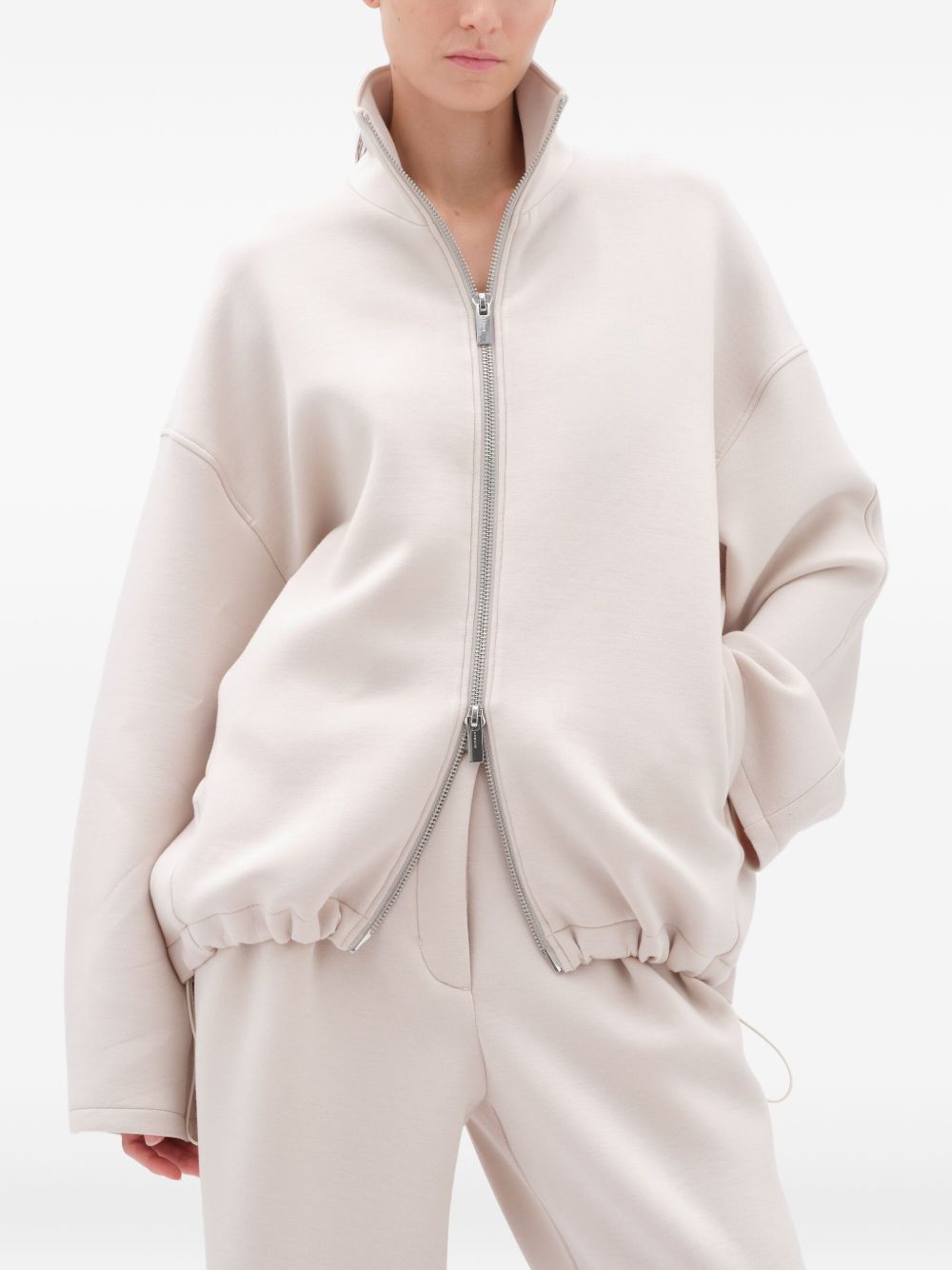 Felpa con zip in grigio ghiaccio Remain - donna 