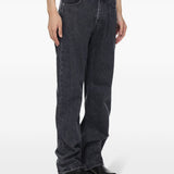 Jeans con bottoni in grigio 