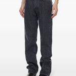 Jeans con bottoni in grigio 