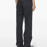Jeans con bottoni in grigio 